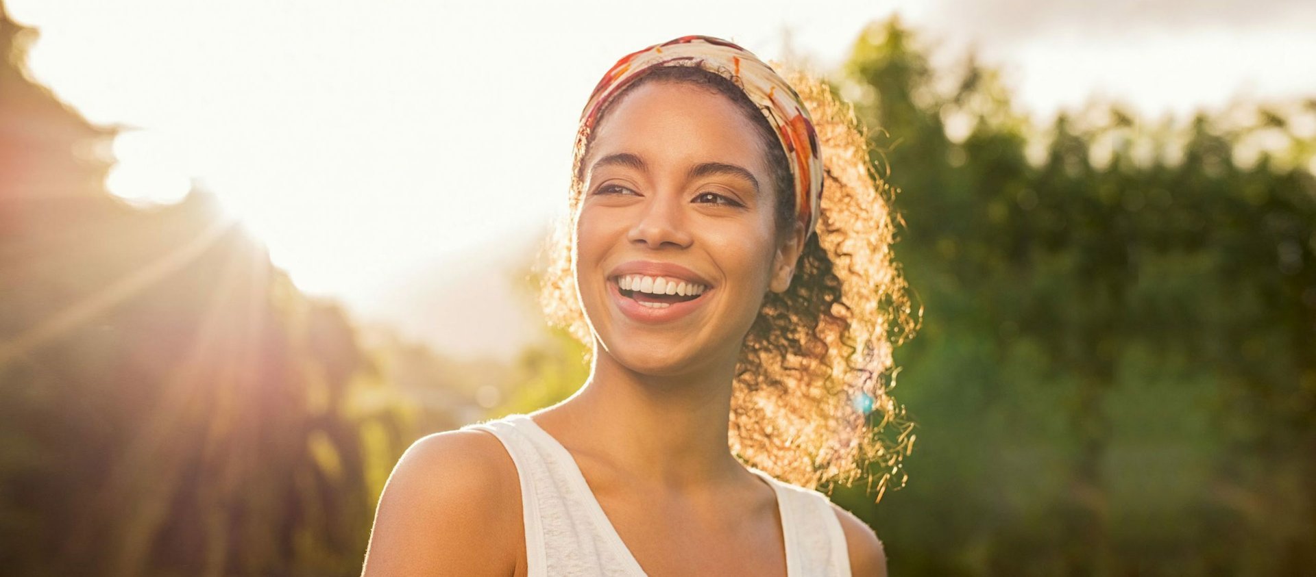 Young African woman smiling ext scaled 1