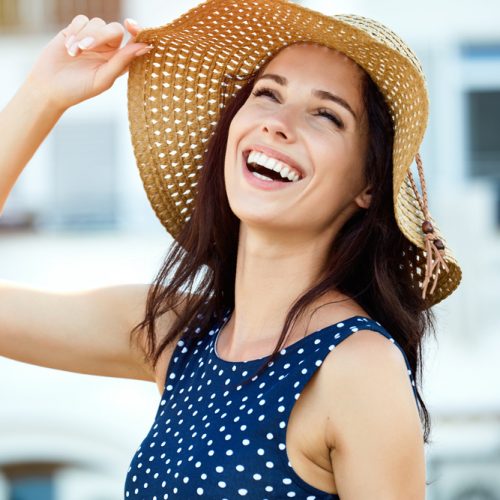 Portrait,Of,A,Beautiful,Woman,In,A,Straw,Hat.,Laughing